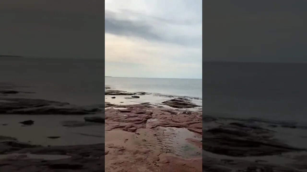 Walking along the rocks on the beach