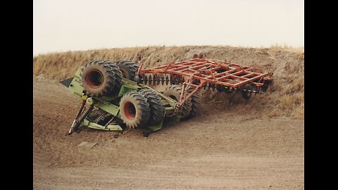 Tractor Accidents Steiger Lands on It's Top After Going Over Sod Bank