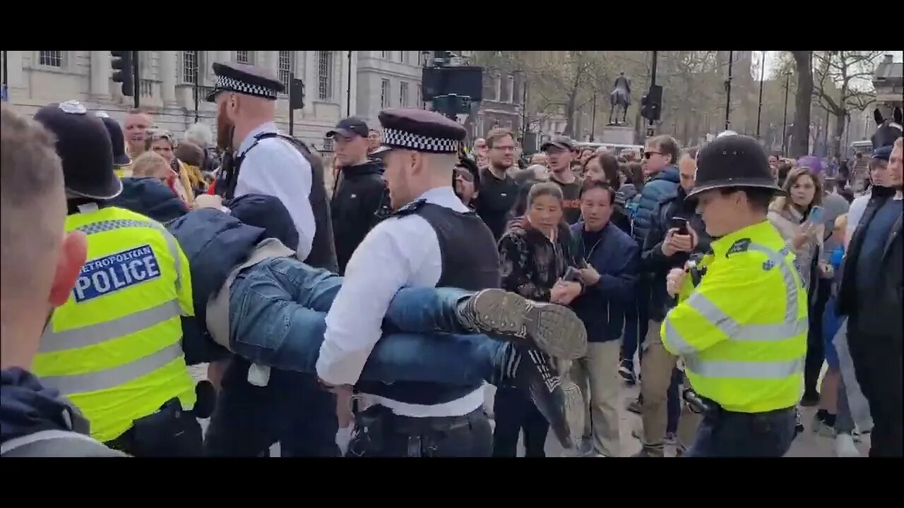 The kings Guard makes way for police carrying a man out of horse Guards parade #horseguardsparade