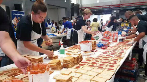 WATCH: Ladles Of Love Make 100000 Sandwiches For The Community