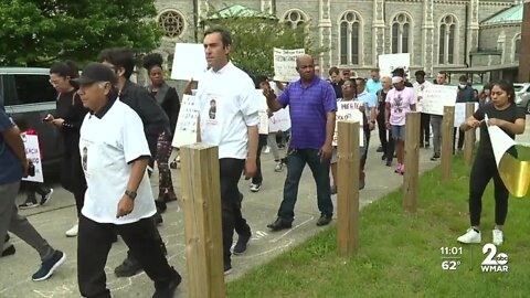 Community walk held for T-Mobile worker killed in robbery