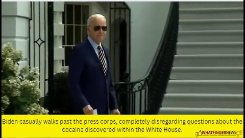 Biden casually walks past the press corps, completely disregarding questions