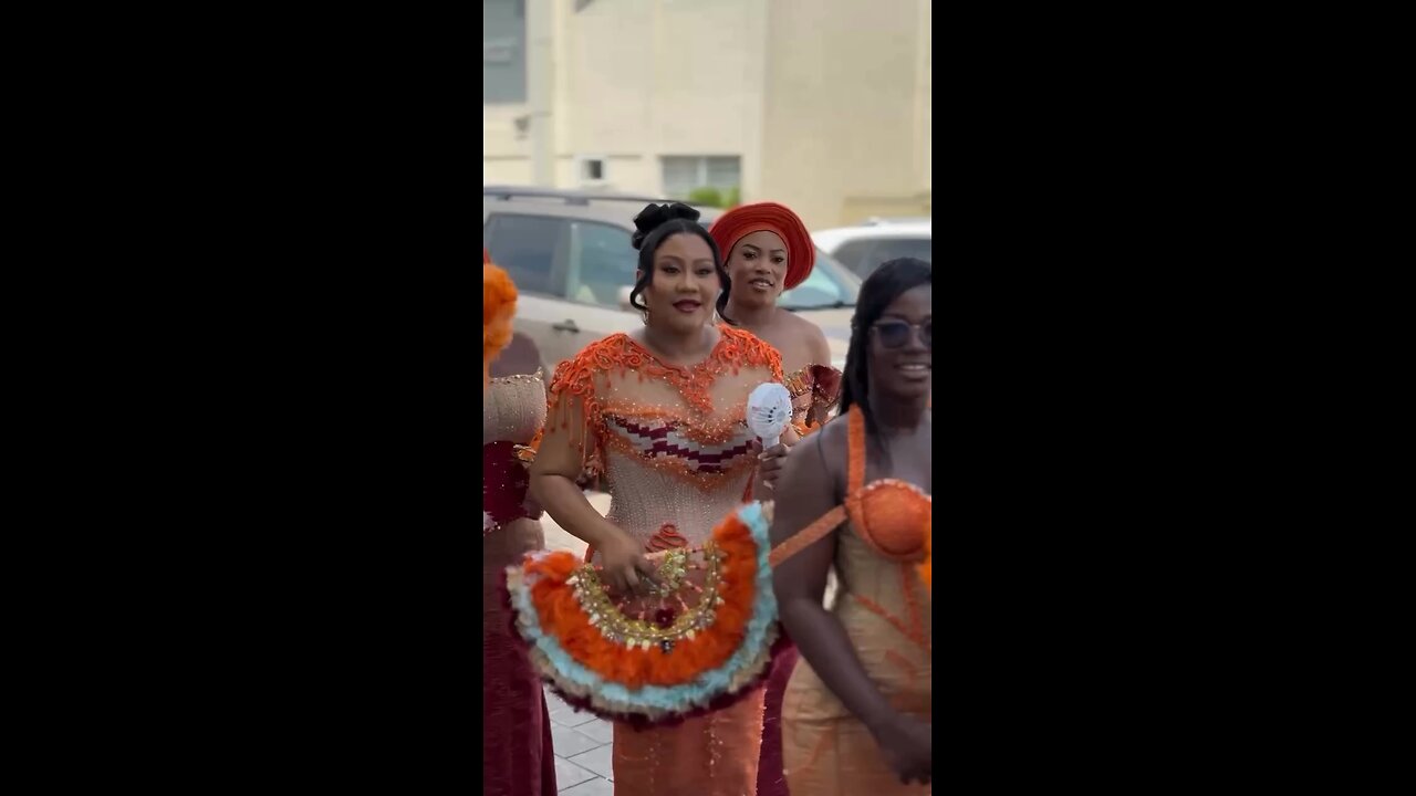 The bride's stunning entrance at her traditional wedding.