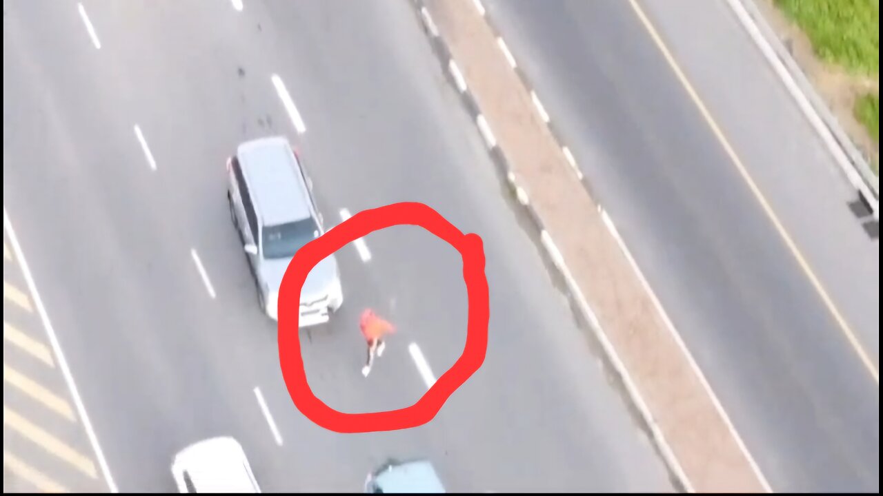 DRONE FOOTAGE OF THIEVES BREAKING INTO CARS IN TRAFFIC IN SOUTH AFRICA!!!!