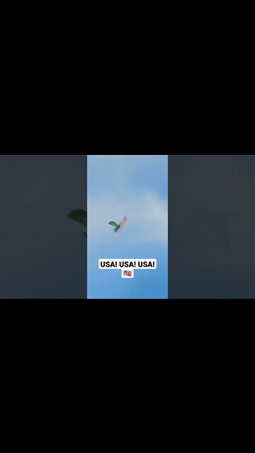 A local skydives with an American flag in support of The People's Convoy!
