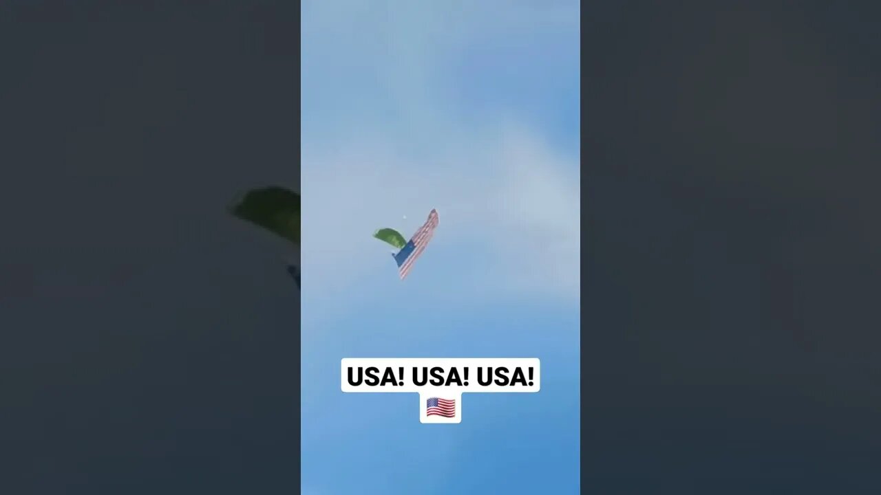 A local skydives with an American flag in support of The People's Convoy!