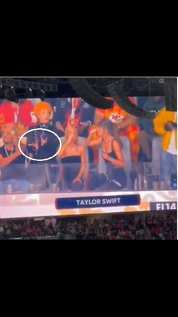 Taylor Swift being an alcoholic while Ice Spice throws up some demonic and Satanic hand gestures.