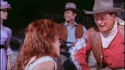 John Wayne chases & spanks Maureen O'Hara in McClintock.