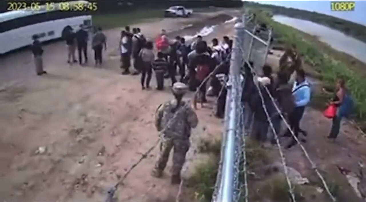 CCTV Camera shows American Soldiers opening gate for Illegal Aliens at the Border! 😳