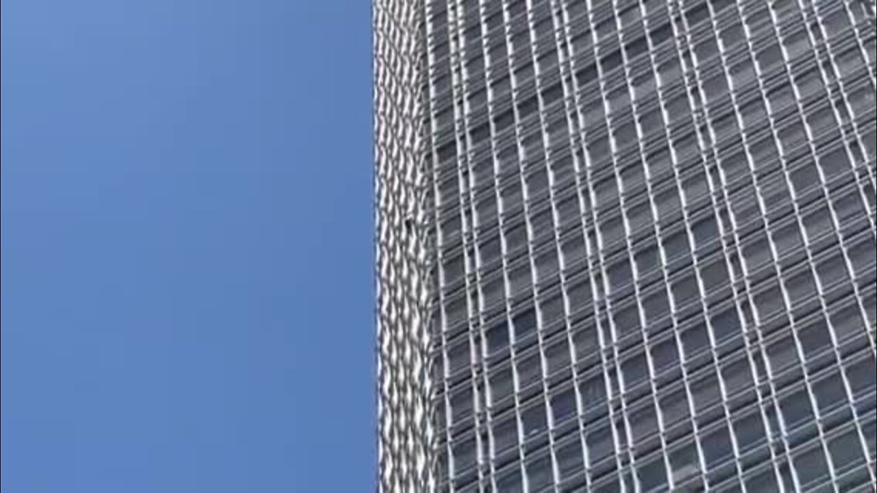 Video shows person scaling Ren Cen