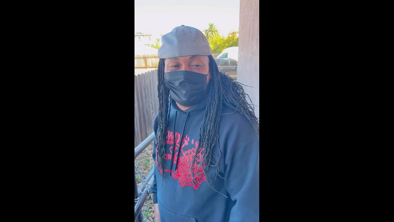 Man with girl braids