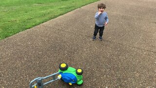 Grant working on his mower