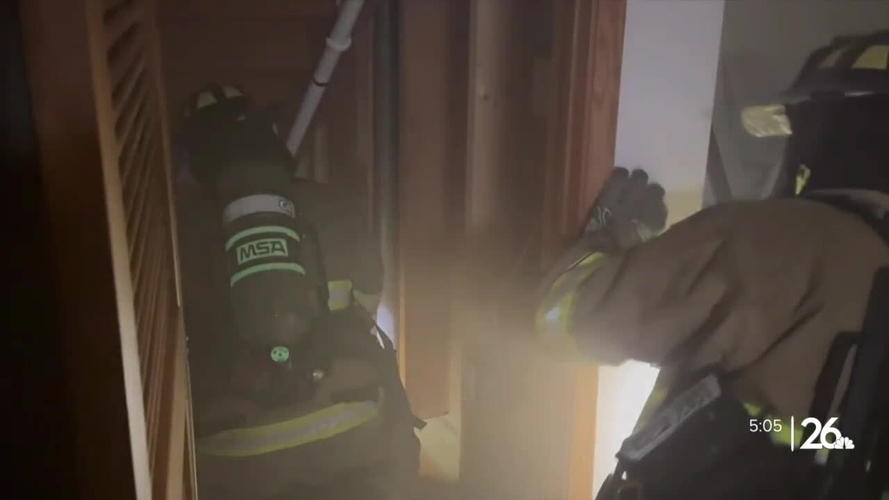 Green Bay firefighter recruits intensely train in full gear for house fire simulation