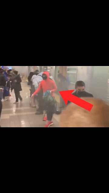 NEW LOOK: "Red Hoodie" Has Subway Shooting Victim Pose for Picture