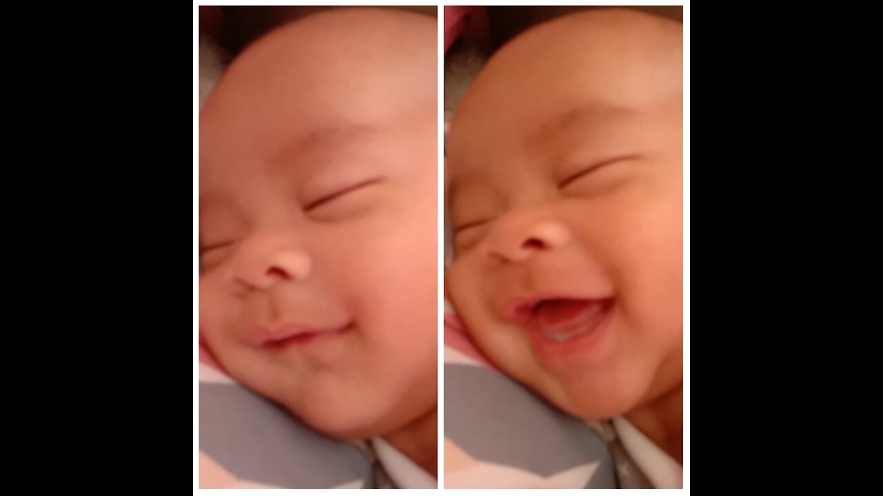 Babies laugh adorable while sleeping.