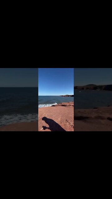 Waves, red sand, and lighthouses