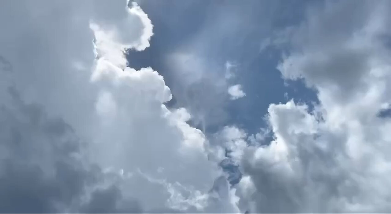 Mysterious light in the clouds over Miami, Florida.