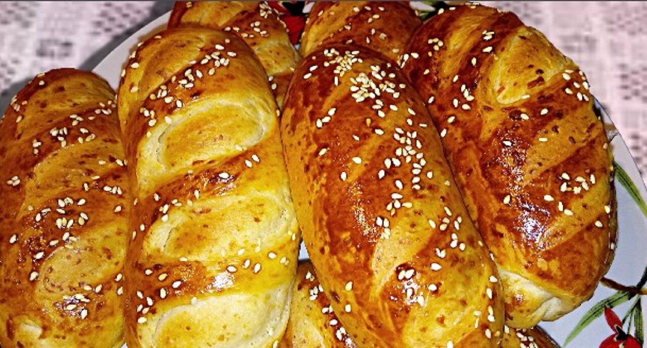 Delicate loafs with cheese for breakfast