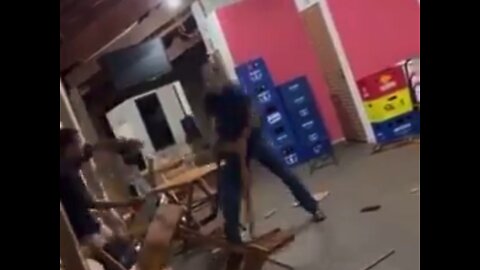 He Defends his Bar against Two Attacks with Chairs