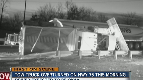 Sand truck flipped over on Highway 75 this morning