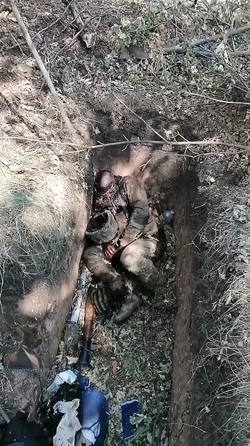 Russian Soldiers of the 90th Guards Tank Division show the battle aftermath with mercenaries