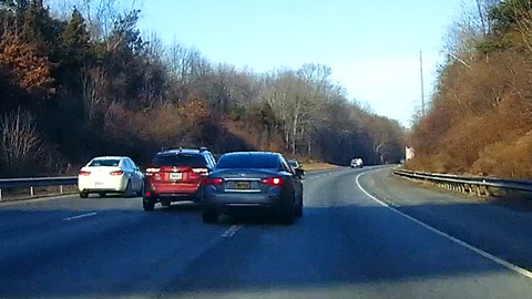 Speeder changes lanes recklessly