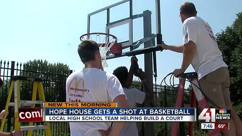 High school basketball team builds court for Hope House