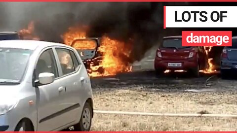 This is the moment 200 vehicles were destroyed by a fire which swept through an Air Force car park