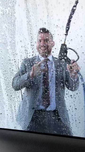Man does a Magic Mike dance in a Car Wash