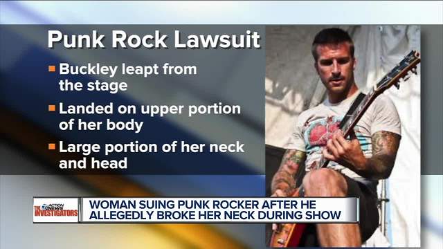 Musician sued for jumping on woman's head at concert in metro Detroit