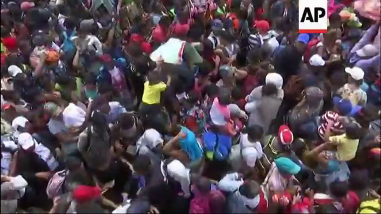 Caravan Hits US-Mexico Border, Members Immediately Start Climbing Fence