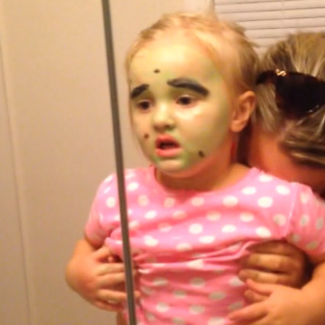 Girl Scared By Her Own Face Paint