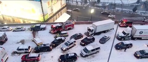 NATIONAL: 14 injured in 50-car pileup