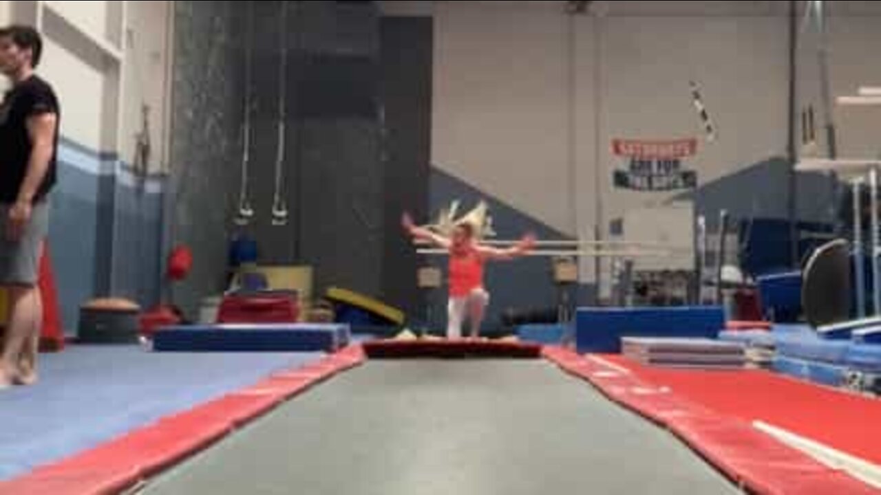 Gymnast "disappears" into pit