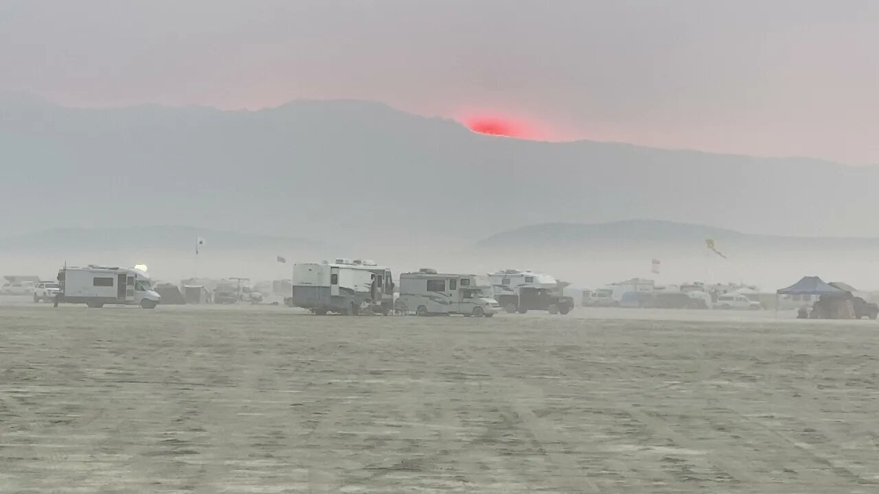 Thousands Howling at the Smokey Sunset - Burning Man Plan B Rogue
