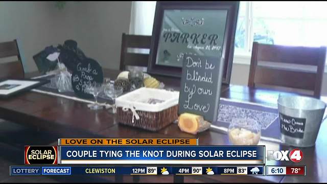 Couple tying the knot during the Solar Eclipse