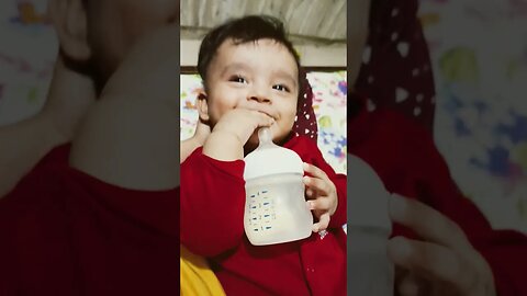 5 months old baby drinking milk