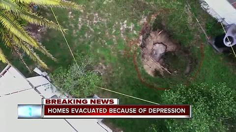 15-foot depression opens up in Pasco County, 4 homes voluntarily evacuated