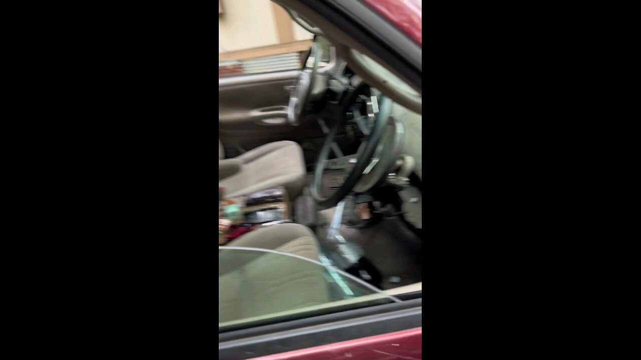 two steering wheels and one car