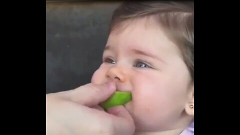 Comedy boy reaction when eating lemon