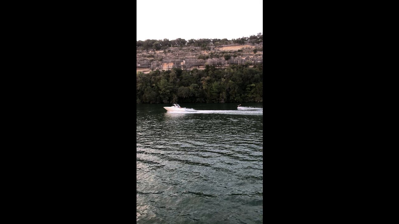 Water skiing with excellent background