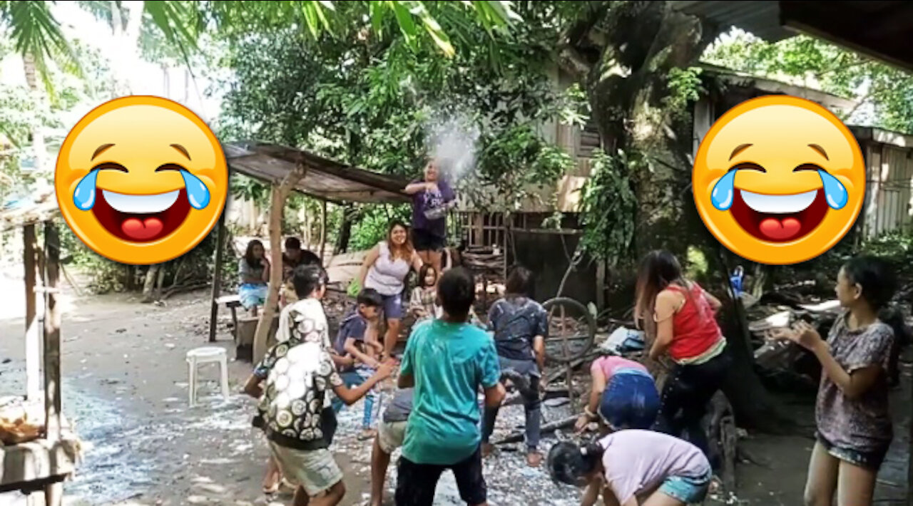 Just for fun! Only in the Philippines Christmas Parlor Game (Toss Out Coin but with flour included)