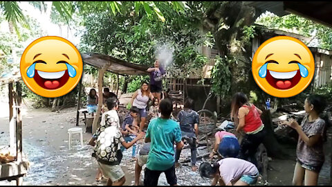 Just for fun! Only in the Philippines Christmas Parlor Game (Toss Out Coin but with flour included)