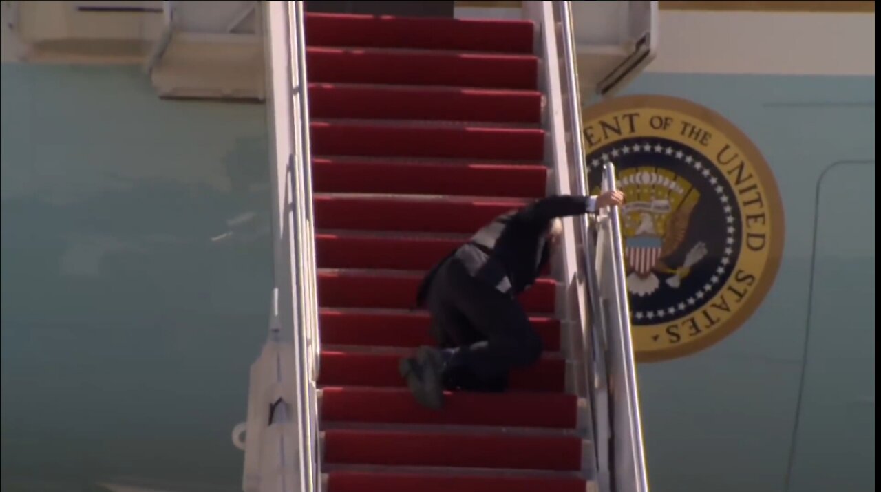 President Biden falls down walking up steps of Air force one