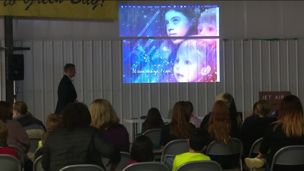 Retired astronaut visits local children