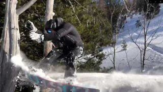 Snowboarder tries new trick and fails miserably