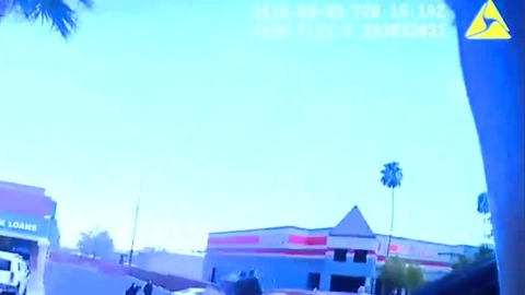 Pawn shop employee 'very brave' after knocking away gun during robbery