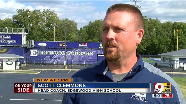 Rival high school football teams make a gesture of solidarity