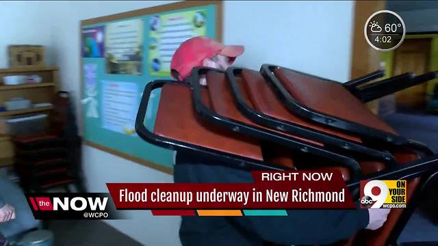 New Richmond High School students make sure flood victims who need help aren't left alone