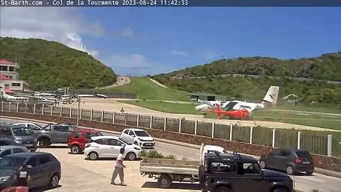 Air Antilles Twin Otter collides with a helicopter during a runway excursion